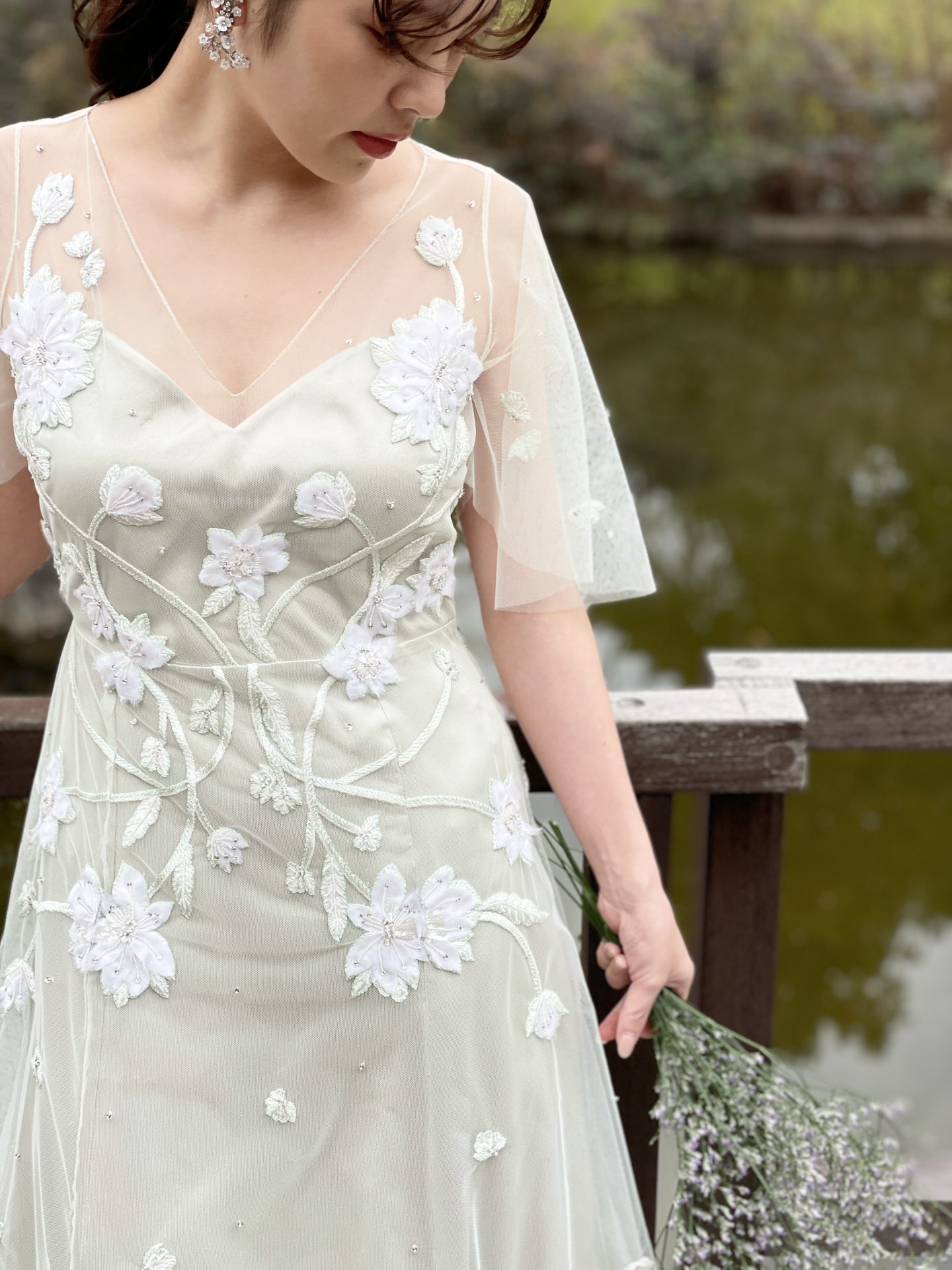 鶴見ノ森迎賓館の提携ドレスショップであるザ・トリートドレッシング大阪店がおすすめするアレクサンドラ・グレッコのグリーンのカラードレス