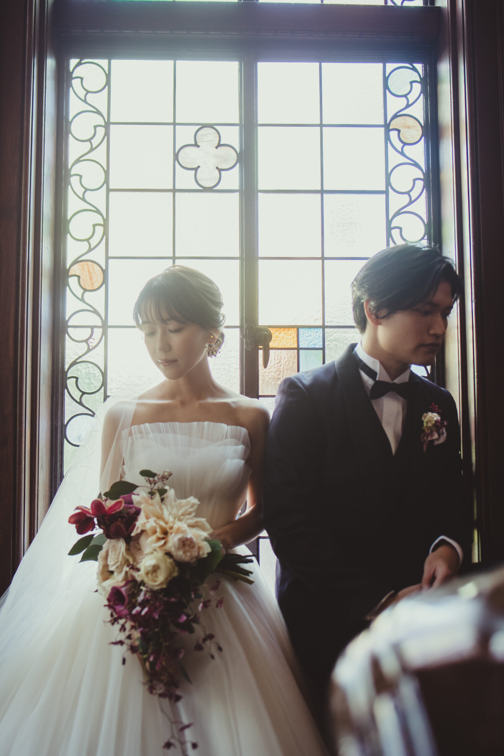 ザ トリート ドレッシング アディション店の専属提携会場赤坂プリンスクラシックハウスでアムサーラのAラインチュールのウェディングドレスとネイビーのタキシードをお召しになったご新郎ご新婦様のパーティーレポート