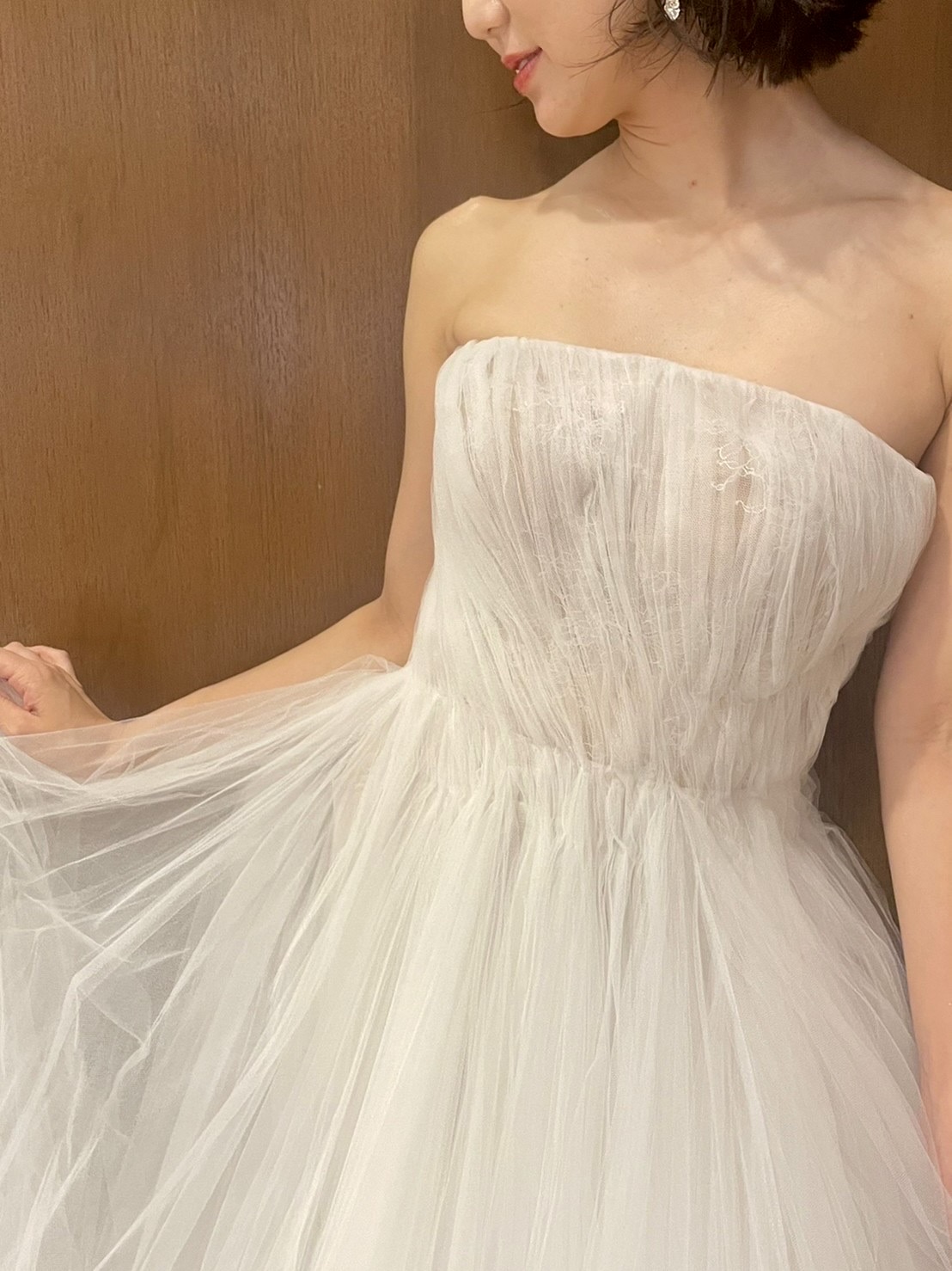 トリートドレッシングよりチュールの透明感が美しいAラインのウェディングドレス