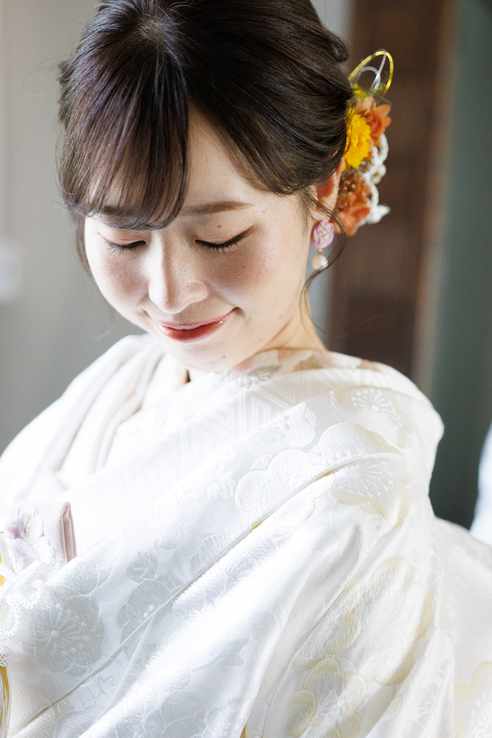 梅の花柄の白無垢に桃色の和装小物をセレクトしたご自身らしいコーディネート