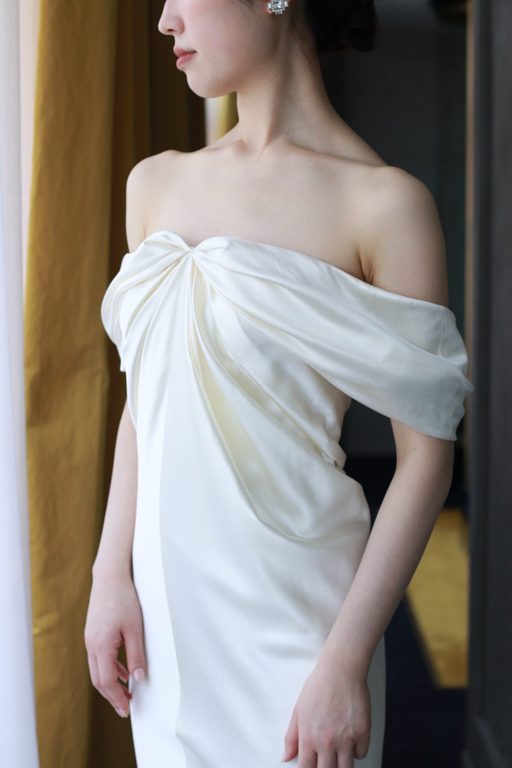 人気のVERAWANGから独立したデザイナーダニエルフランケルが手掛ける、オフショルダーのウェディングドレスはTHE TREAT DRESSING(ザトリートドレッシング)でお取り扱いしています。