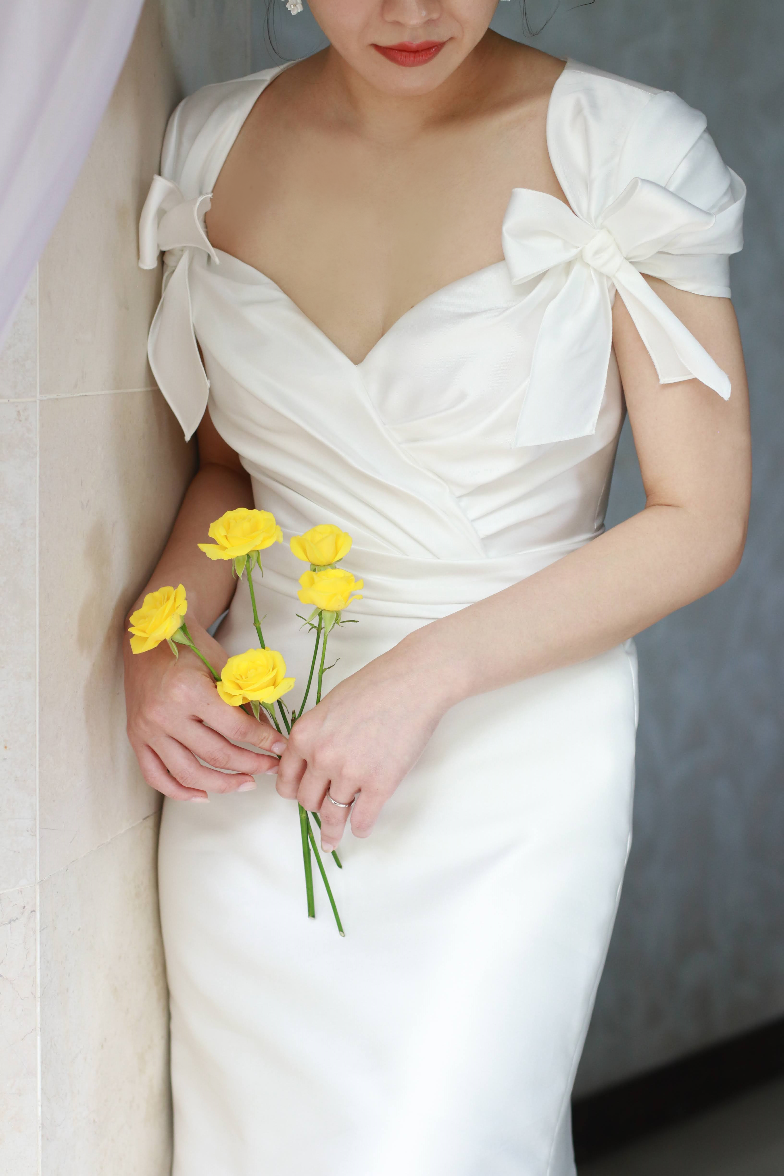 フェミニンで幸福感のあるリーム アクラの新作ウェディングドレスは、THE TREAT DRESSING福岡店でレンタルいただける人気のマーメイドラインの一着です