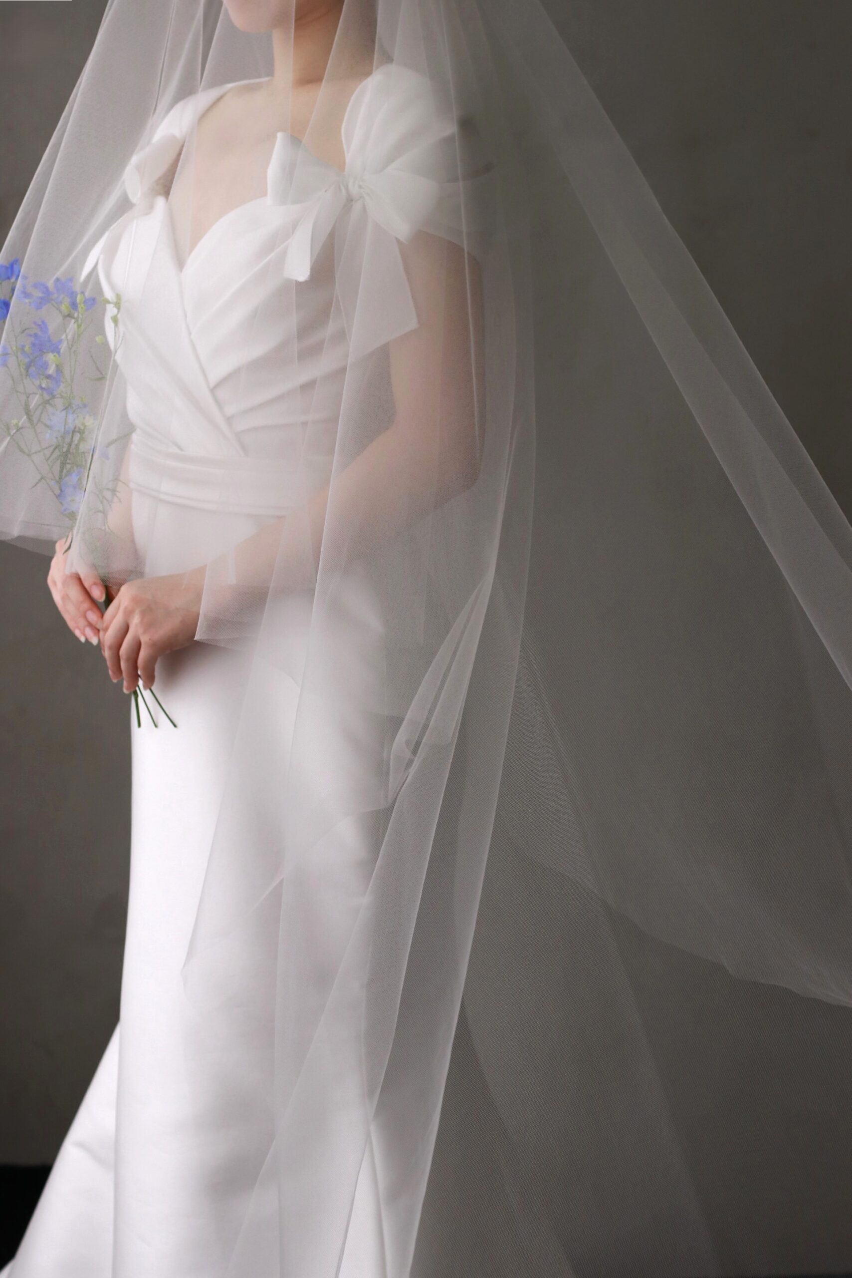 ザトリートドレッシングがお取り扱いしているリームアクラよりセレクトしたマーメイドラインはリームアクラらしくリボンがキャッチーでロマンティックにデザインされた一着